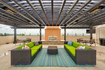 Rooftop outdoor lounge and kitchen